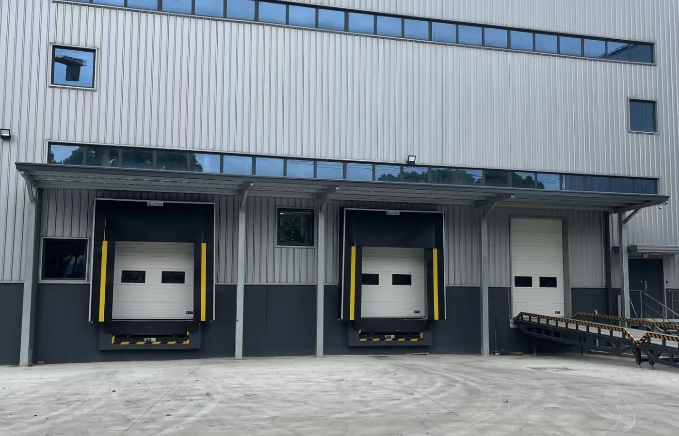 SEPPES industrial doors and dock shelters installed at warehouse loading bays